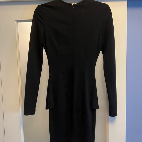 Torn by Ronny Kobo peplum black mini dress. Bought in NYC, and work only twice. - Picture 3 of 3